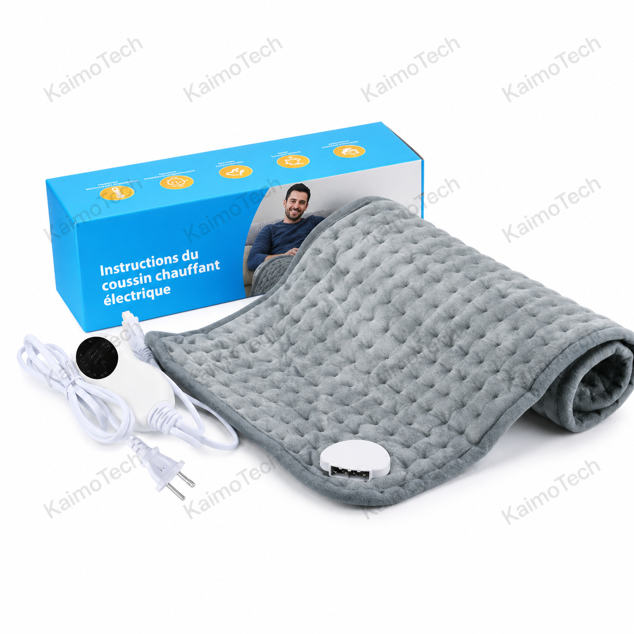 Coussin chauffant électrique KaimoTech — contenu de la boîte bleue : coussin gris velours enroulé, câble avec contrôleur rotatif, prise européenne 2 broches et boîtier de connexion magnétique — notice d'instructions incluse